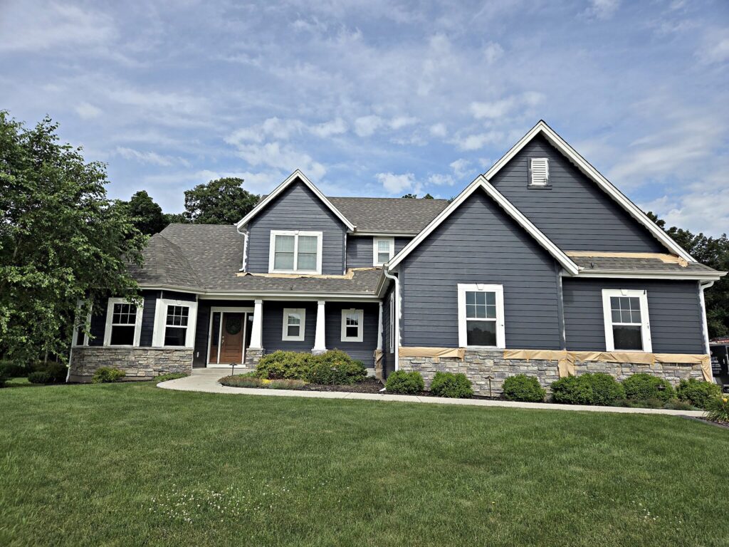 Blue gray house white trim in Mukwonago