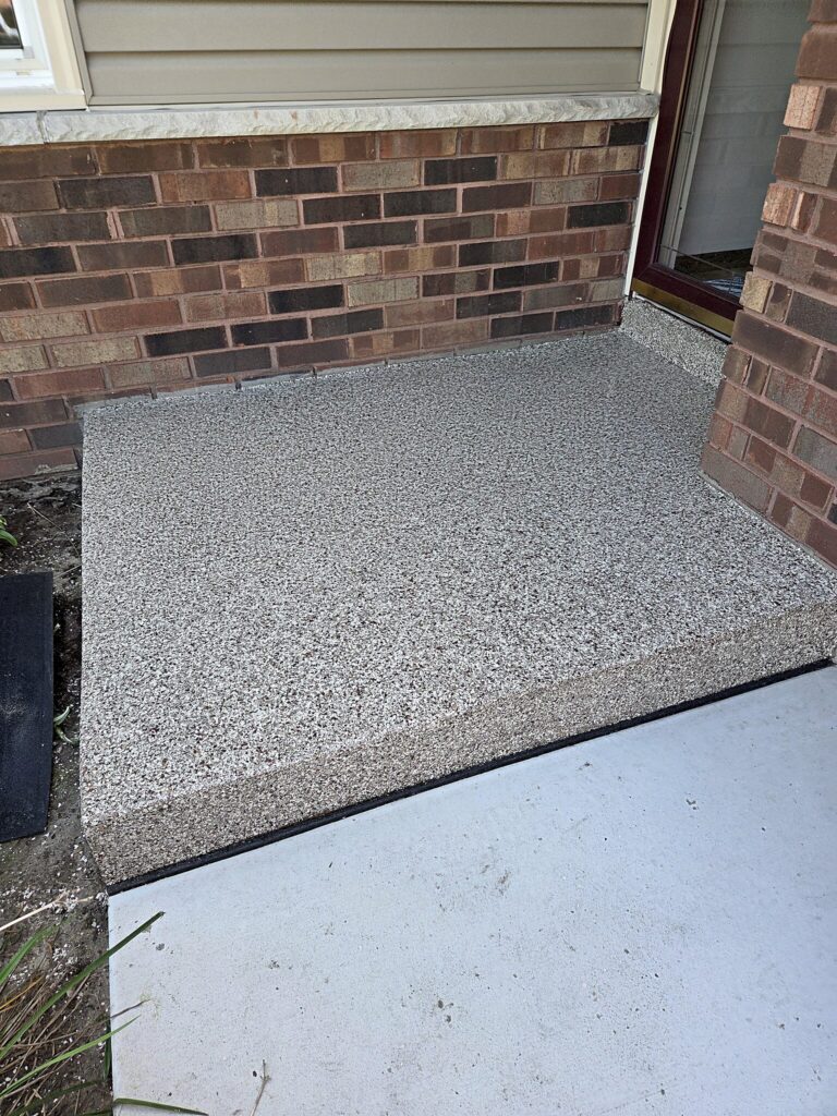 Flake coated concrete step in Eagle
