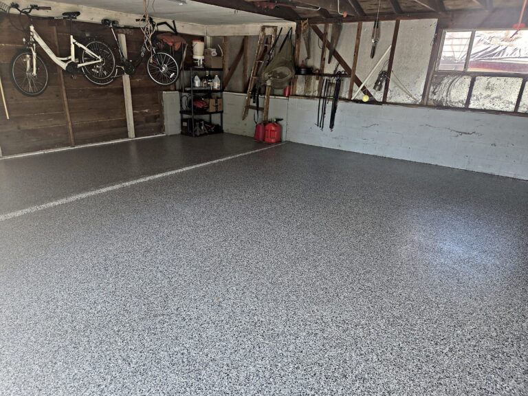 Gray flake-coated garage floor in Mukwonago