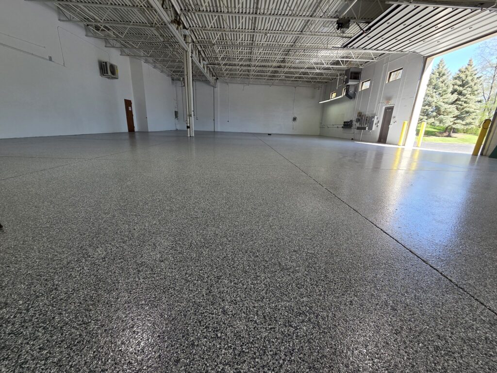 Large room gray flake floor in New Berlin