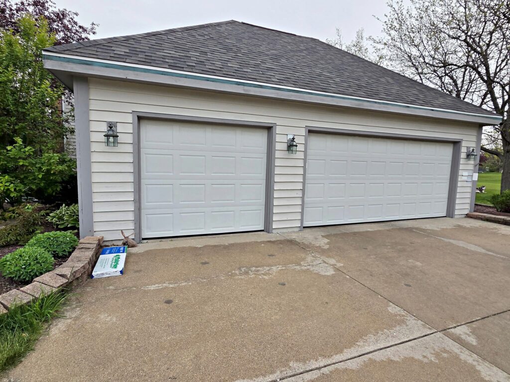 Light garage doors exterior in Waukesha