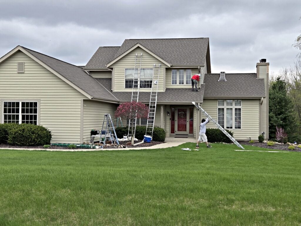 Light house exterior painting ladders in Mukwonago