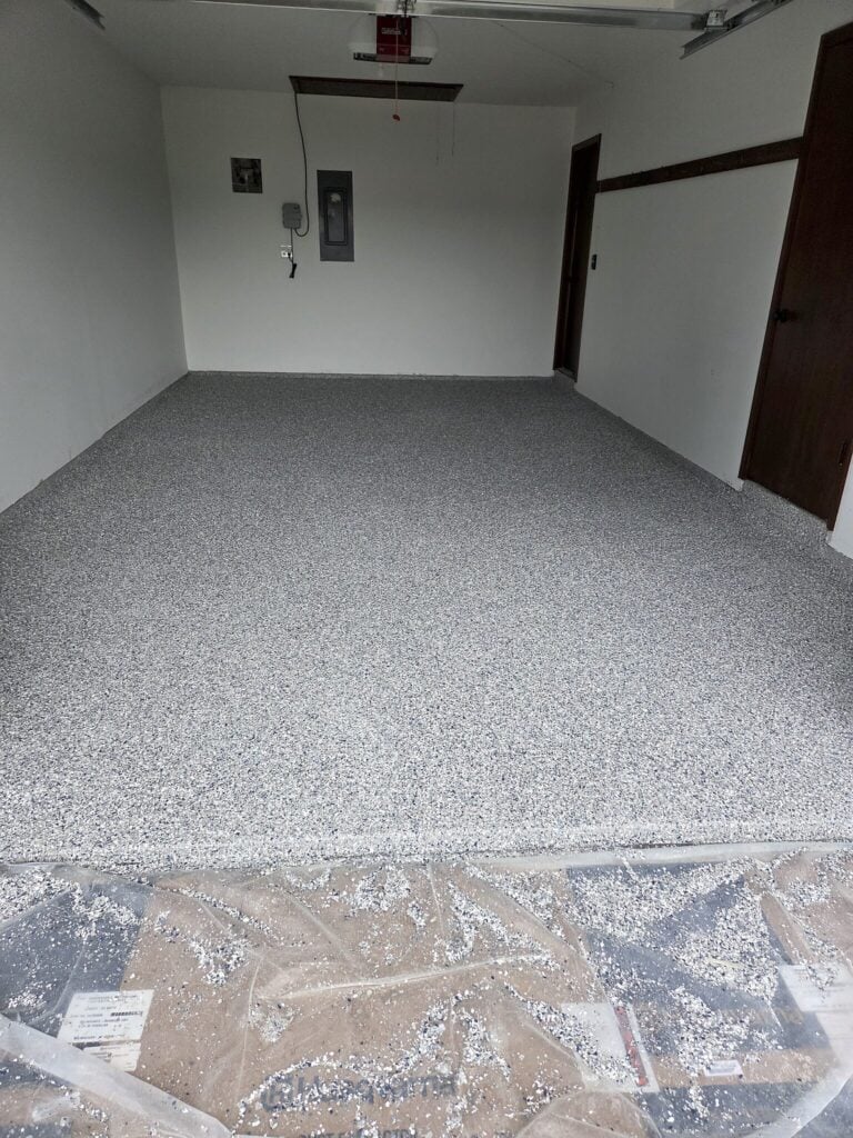 Finished flake-coated single-car garage floor in East Troy