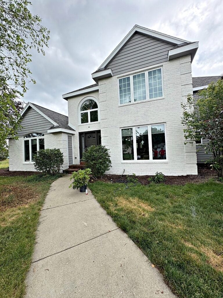 White two story house exterior in Hartland