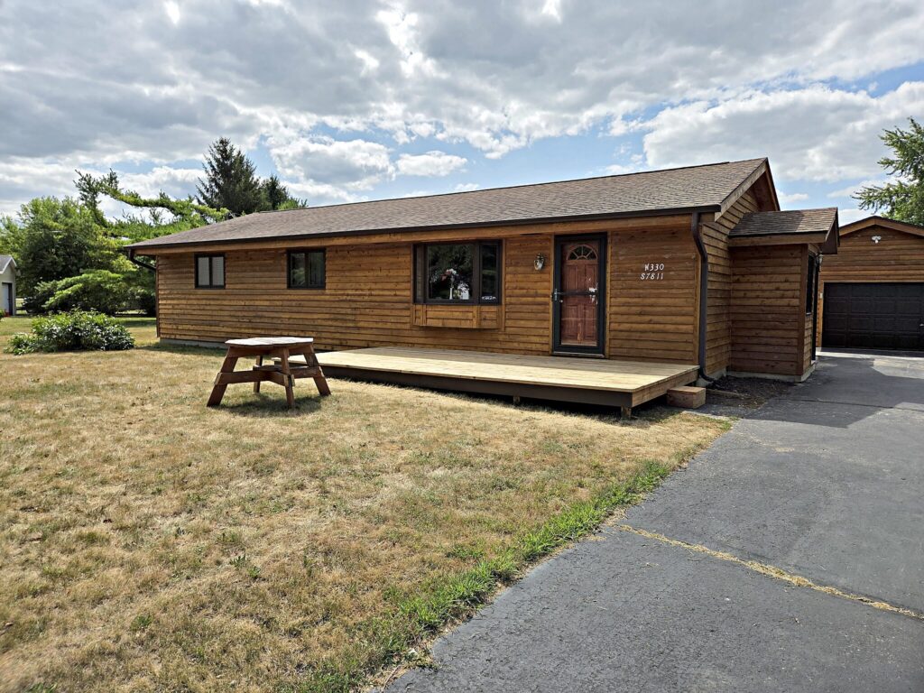 Wood sided house exterior in Mukwonago