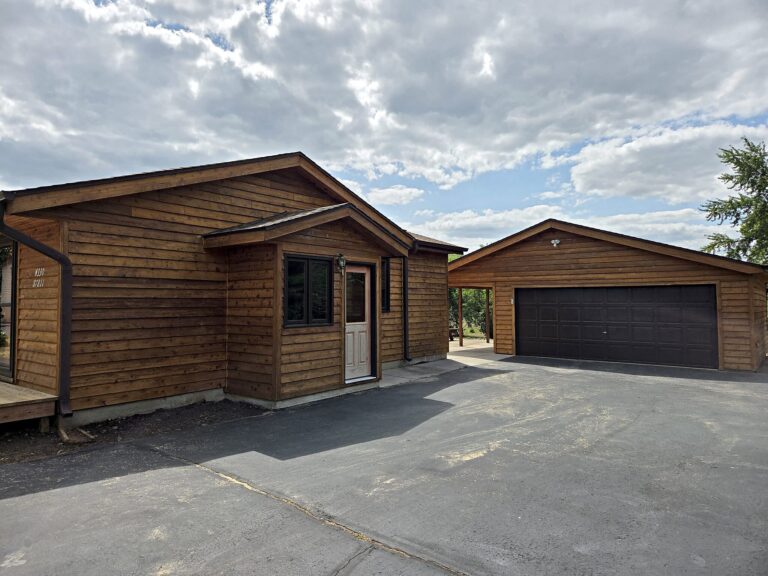 Stained cedar ranch and detached garage in Mukwonago